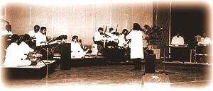Rajan conducting his orchestra, Malabarians.